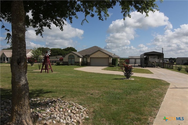 2734 Rock Rd, Troy, TX 76579 - view of front of house with concrete driveway, a carport, a front lawn, and an attached garage