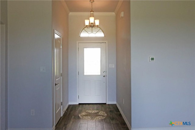 2734 Rock Rd, Troy, TX 76579 - entryway with a chandelier, dark wood-type flooring, and crown molding