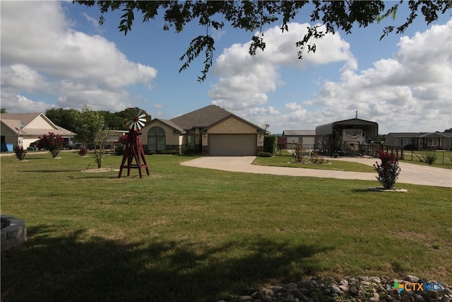 2734 Rock Rd, Troy, TX 76579 - view of grassy yard featuring driveway, a detached carport, and a garage