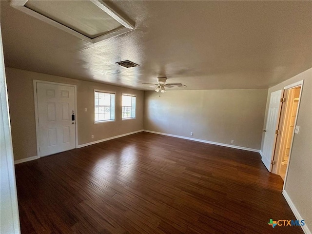 305 Larkspur St, Victoria, TX 77904 - interior space featuring visible vents, dark wood-type flooring, ceiling fan, baseboards, and attic access
