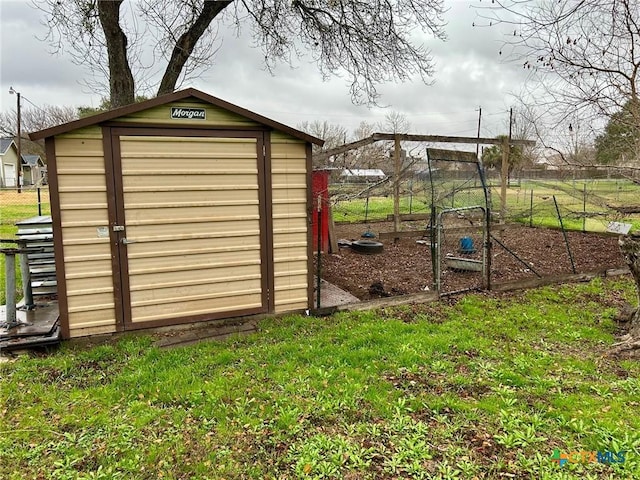 305 Larkspur St, Victoria, TX 77904 - view of poultry coop with a lawn