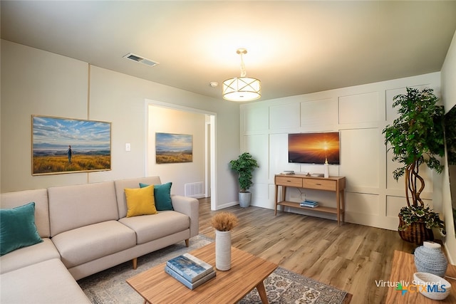 living room featuring wood-type flooring