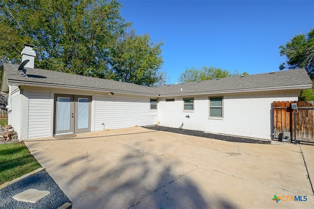 rear view of house with a patio area