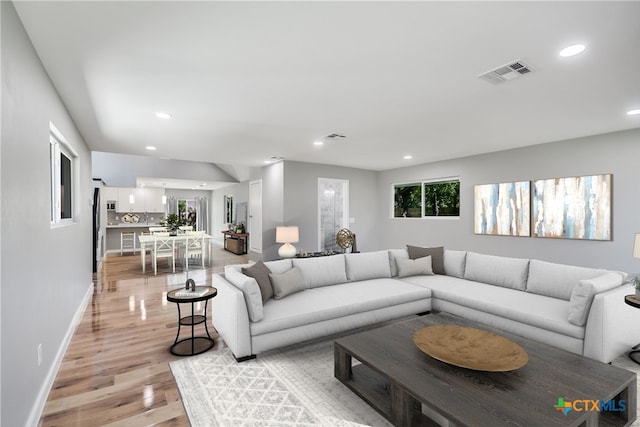 living room featuring light hardwood / wood-style flooring