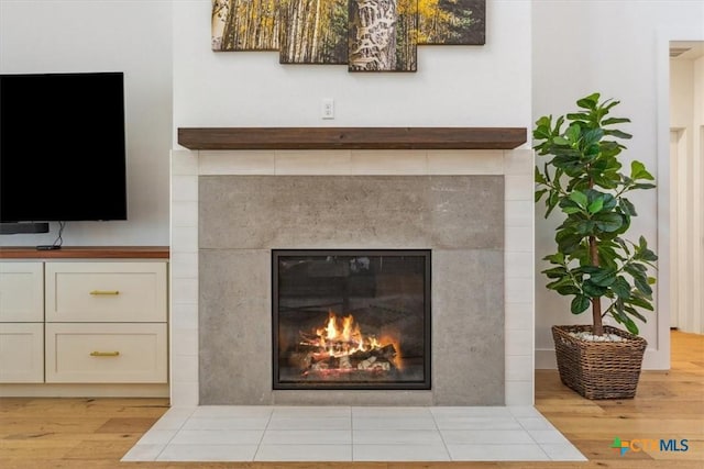127 Cumberland Dr, Belton, TX 76513 - detailed view of wood finished floors and a tile fireplace