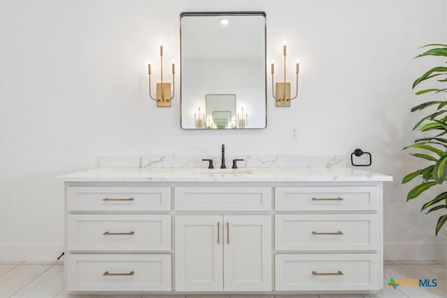 127 Cumberland Dr, Belton, TX 76513 - bathroom with tile patterned floors, vanity, and baseboards