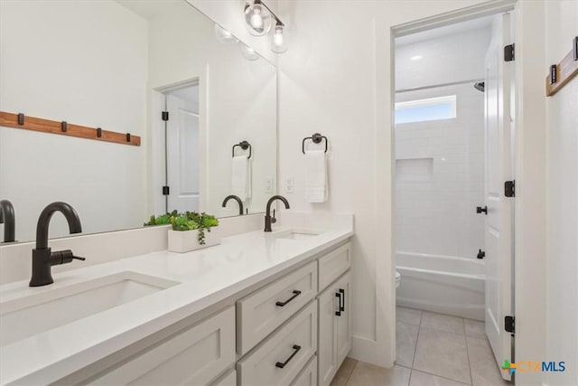 127 Cumberland Dr, Belton, TX 76513 - full bath featuring tile patterned floors, double vanity, and shower / bathtub combination