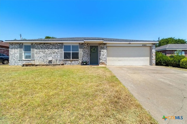 single story home with a front lawn and a garage