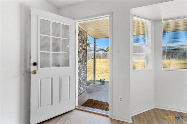 doorway featuring hardwood / wood-style floors