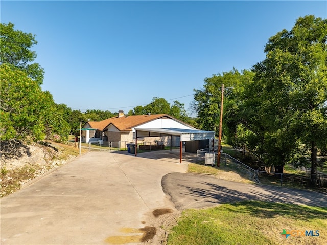 view of front facade featuring a carport