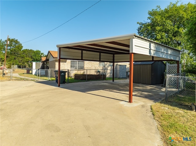 view of vehicle parking with a carport