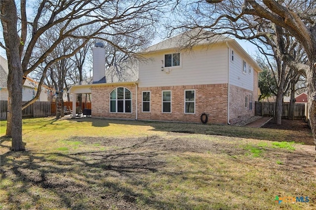 2604 Whitehurst Dr, Round Rock, TX 78681 - rear view of house featuring a chimney, a fenced backyard, and brick siding