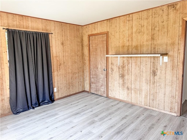 7260 Fm 531, Hallettsville, TX 77964 - empty room featuring wood finished floors and wood walls