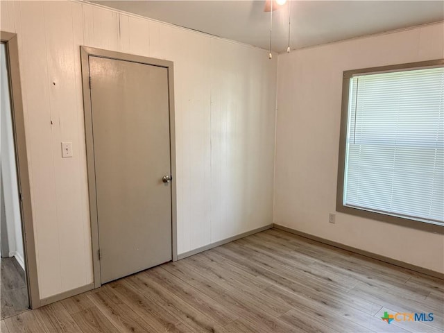 7260 Fm 531, Hallettsville, TX 77964 - spare room with light wood-style flooring and baseboards