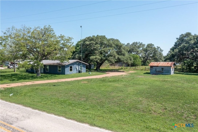 7260 Fm 531, Hallettsville, TX 77964 - view of green lawn featuring an outdoor structure