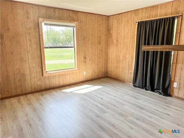 7260 Fm 531, Hallettsville, TX 77964 - empty room featuring wood finished floors, baseboards, and wooden walls
