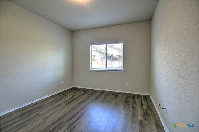 5810 Ambrose Cir, Temple, TX 76502 - unfurnished room featuring wood finished floors and baseboards