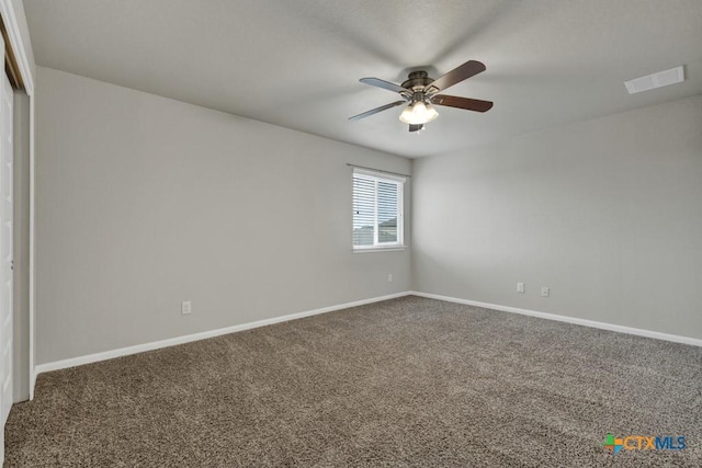 carpeted empty room with ceiling fan