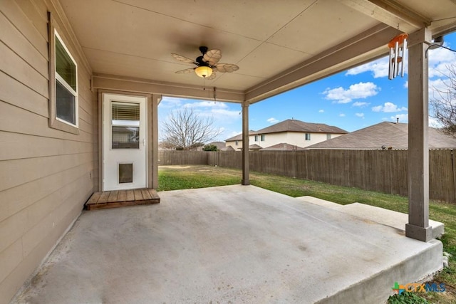 view of patio / terrace featuring ceiling fan