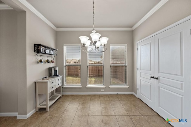 dining space featuring baseboards, ornamental molding, a chandelier, and light tile patterned flooring