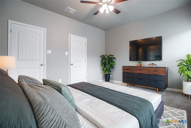 carpeted bedroom featuring ceiling fan