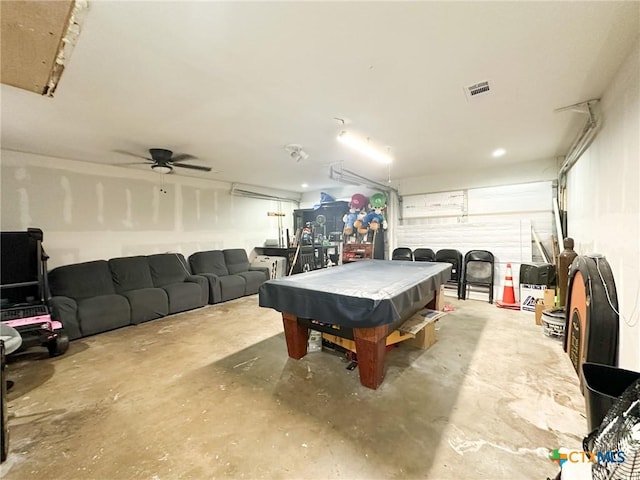 recreation room with ceiling fan, billiards, and concrete floors