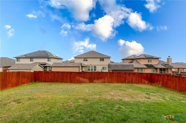 view of yard featuring a residential view