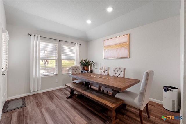 6038 Ballast Trl, New Braunfels, TX 78132 - dining room with wood finished floors, baseboards, vaulted ceiling, and recessed lighting