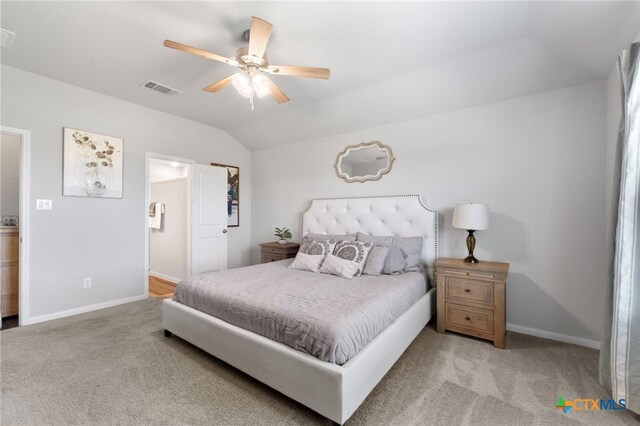 6038 Ballast Trl, New Braunfels, TX 78132 - carpeted bedroom with lofted ceiling, baseboards, and ceiling fan
