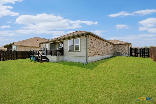 6038 Ballast Trl, New Braunfels, TX 78132 - rear view of house with a deck, central air condition unit, and brick siding