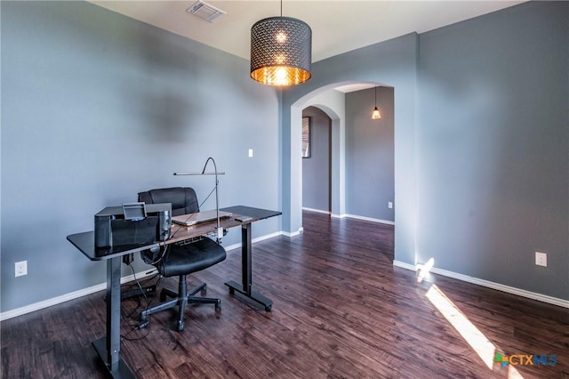 home office featuring dark hardwood / wood-style flooring