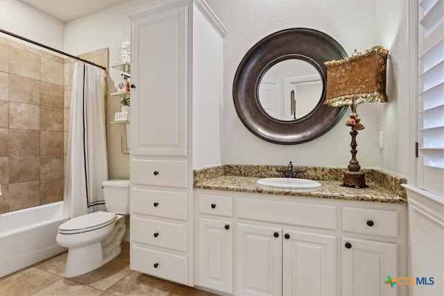 full bathroom featuring toilet, shower / tub combo, and vanity