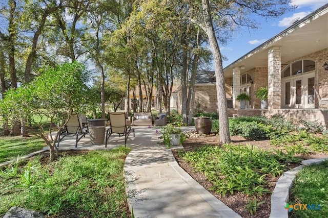 view of community featuring a patio area