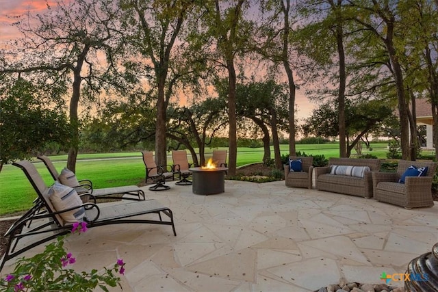 surrounding community featuring an outdoor fire pit, a yard, and a patio