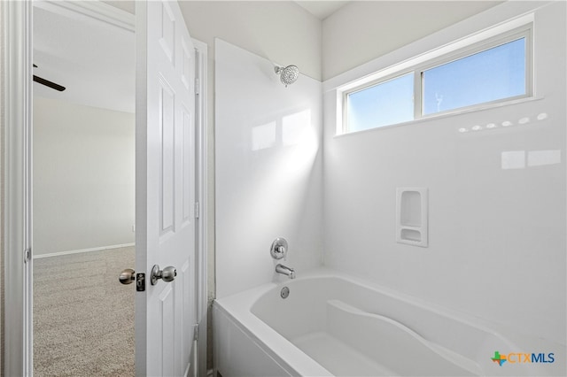 bathroom featuring washtub / shower combination