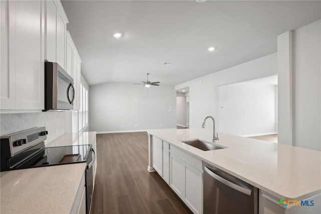 kitchen featuring white cabinets, sink, and appliances with stainless steel finishes