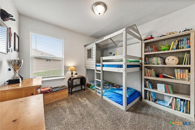 bedroom featuring carpet flooring