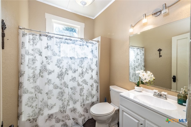 bathroom with vanity, toilet, walk in shower, and ornamental molding