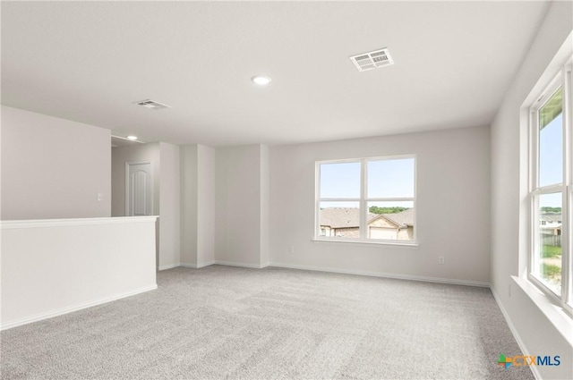 3815 Leming Ct, Temple, TX 76504 - spare room featuring light carpet and recessed lighting
