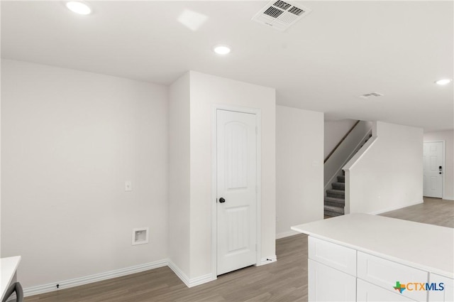 3815 Leming Ct, Temple, TX 76504 - interior space with light wood-style flooring, white cabinetry, recessed lighting, and light countertops