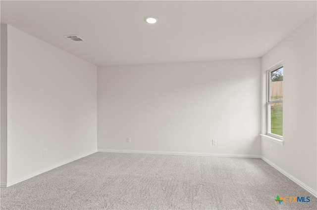 3815 Leming Ct, Temple, TX 76504 - empty room with carpet, healthy amount of natural light, and recessed lighting