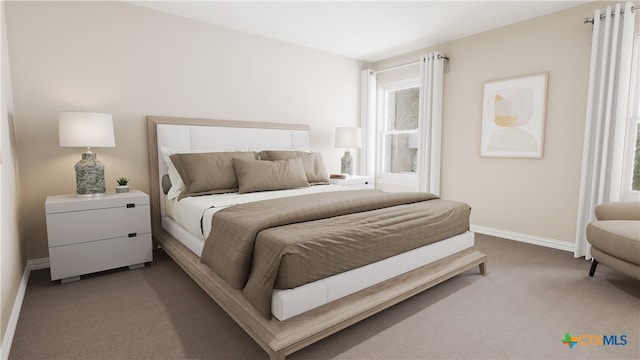 bedroom with baseboards and carpet flooring
