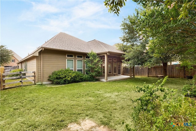 2989 Saddlehorn Dr, Seguin, TX 78155 - back of house featuring a fenced backyard, a patio area, and a shingled roof