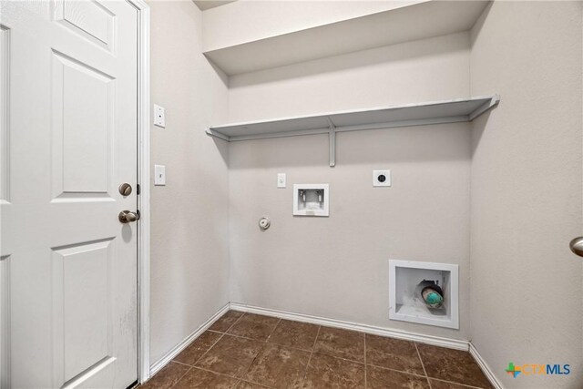 4805 Farrell Ln, Killeen, TX 76549 - washroom featuring electric dryer hookup, hookup for a gas dryer, hookup for a washing machine, and dark tile patterned flooring