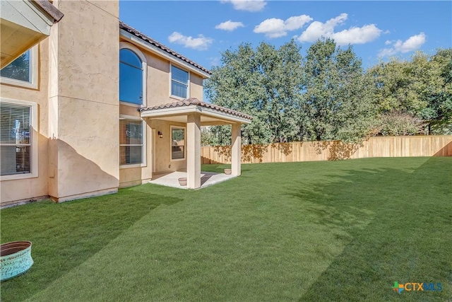 view of yard with a patio area