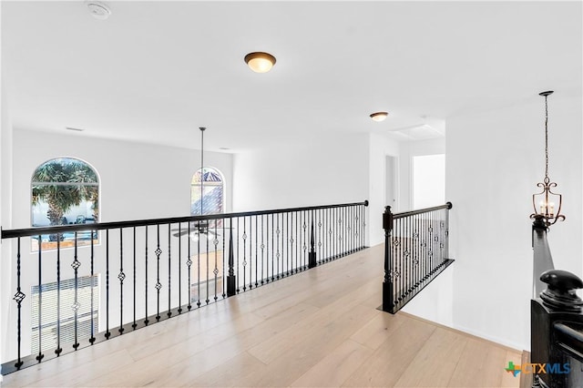 hall with light hardwood / wood-style flooring