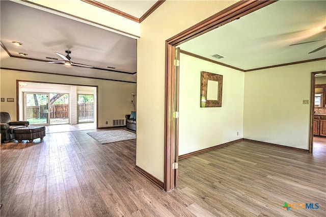 2702 Olympia Dr, Temple, TX 76502 - hall with wood finished floors and ornamental molding