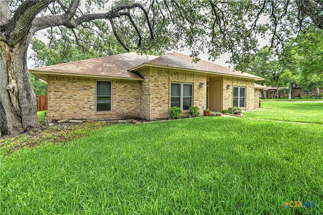 2702 Olympia Dr, Temple, TX 76502 - view of front of property with brick siding and a shingled roof
