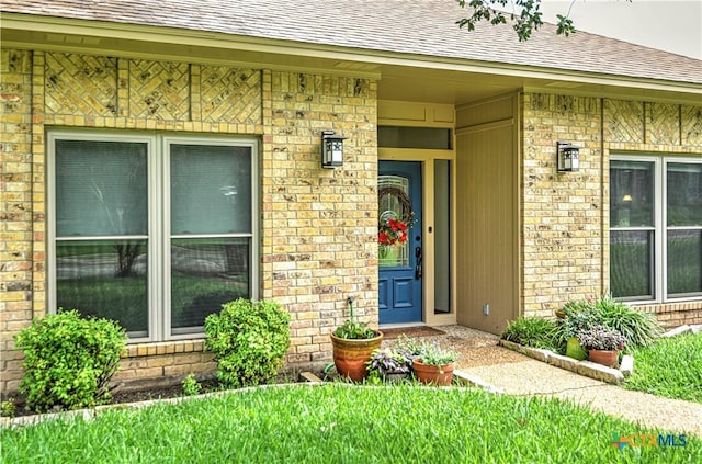 2702 Olympia Dr, Temple, TX 76502 - entrance to property with a shingled roof and brick siding
