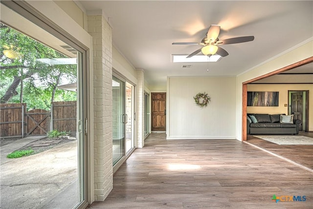 2702 Olympia Dr, Temple, TX 76502 - hallway with wood finished floors and ornamental molding